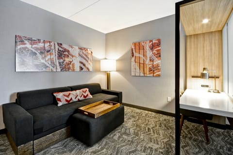 Suite, Multiple Beds | Desk, laptop workspace, blackout drapes, iron/ironing board