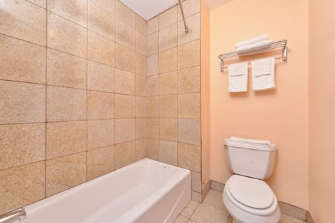 Standard Room, 1 King Bed | Bathroom | Combined shower/tub, rainfall showerhead, free toiletries, towels