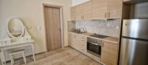 Apartment, Ground Floor | Private kitchen | Full-size fridge, oven, stovetop, coffee/tea maker