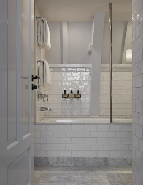 Family Suite Canal View | Bathroom | Rainfall showerhead, designer toiletries, hair dryer, bathrobes