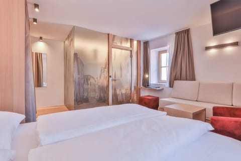 Premium bedding, in-room safe, individually decorated