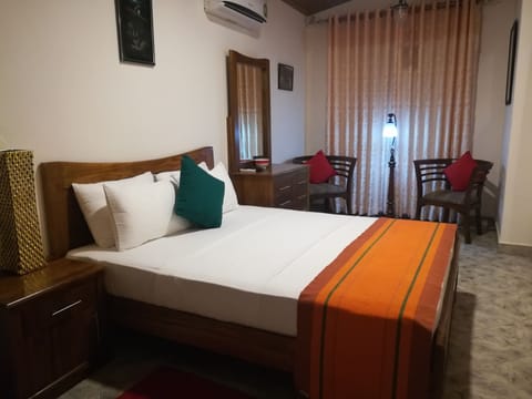 Deluxe Double Room with Wooden Deck | Minibar, in-room safe, desk, laptop workspace