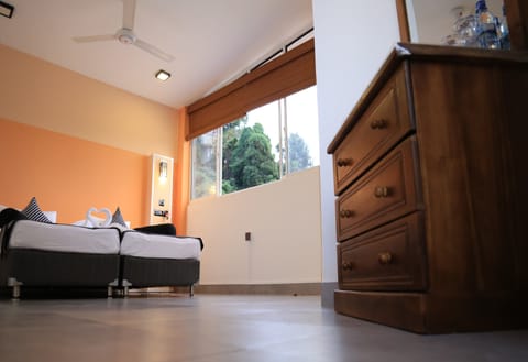 Deluxe Double Room (With Attached Bathroom) | Iron/ironing board, bed sheets