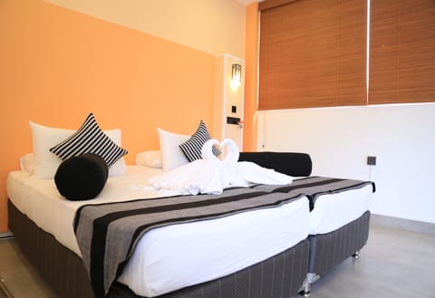 Deluxe Double Room (With Attached Bathroom) | Iron/ironing board, bed sheets