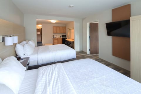 Suite, Multiple Beds | In-room safe, desk, blackout drapes, soundproofing