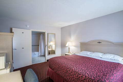 Deluxe Room, 1 King Bed, Non Smoking, Refrigerator & Microwave | Desk, free WiFi, bed sheets