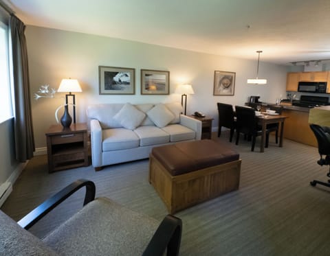 Suite, 1 Bedroom | Living area | 32-inch flat-screen TV with cable channels, TV, fireplace