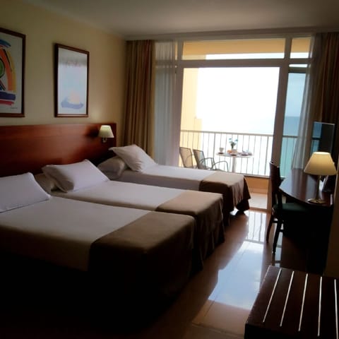 Triple Room, Ocean View (2 adults and 1 child) | Premium bedding, minibar, individually furnished, desk