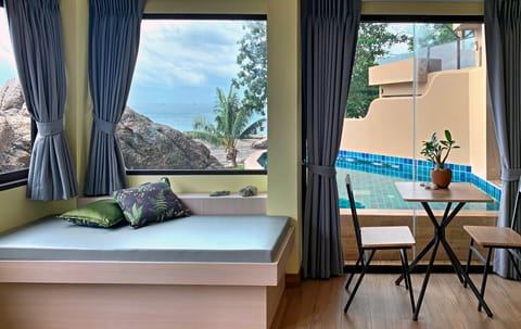 Deluxe Pool Villa | Minibar, in-room safe, desk, blackout drapes