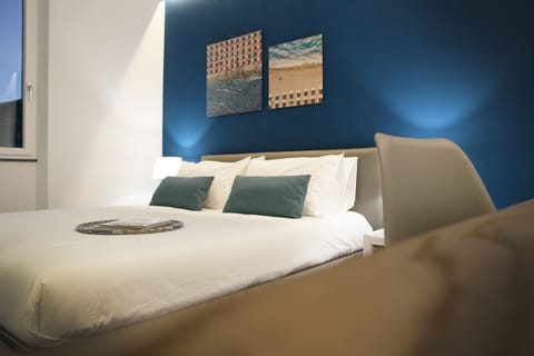 Basic Double Room (Blu) | Premium bedding, desk, rollaway beds, free WiFi