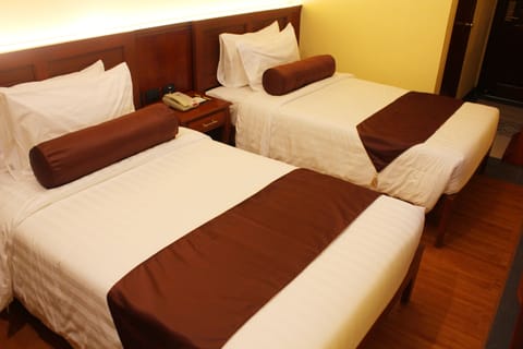 Superior Twin Room (Complimentary Use of Swimming Pool) | Minibar, in-room safe, desk, bed sheets