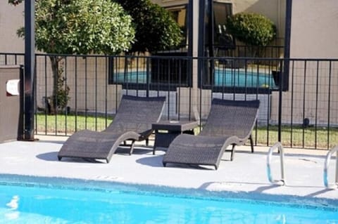 Seasonal outdoor pool, open 11:00 AM to 10:00 PM, sun loungers