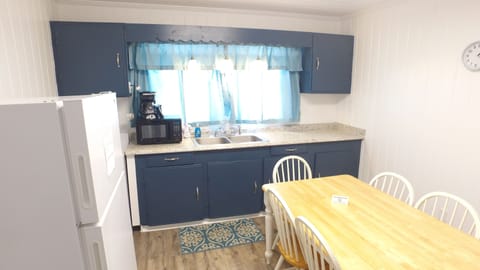 Family Cottage, Multiple Beds (Star Fish 8) | Private kitchen | Fridge, microwave, coffee/tea maker, cookware/dishes/utensils