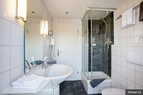Suite, Non Smoking, Balcony | Bathroom | Shower, free toiletries, hair dryer, bathrobes