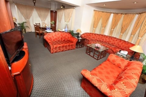 Club Room | Living area | Flat-screen TV