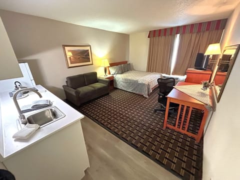 Standard Studio Suite, 1 Queen Bed, Non Smoking, Kitchenette | Desk, blackout drapes, iron/ironing board, free WiFi