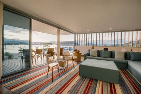 Suite, Ocean View (Fasano) | Living area | 50-inch Smart TV with digital channels, TV, iPod dock