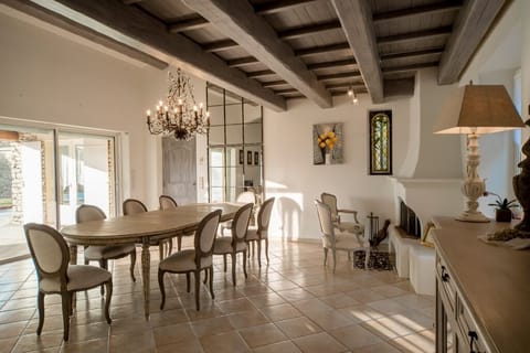 Living room, dining room with access to the terrace and kitchen