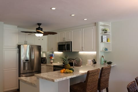 full size kitchen with breakfast bar, new appliances