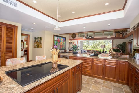 Large kitchen island and food prep area.
