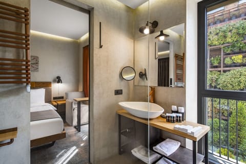 Twin Room (Iota Twin) | Bathroom | Shower, free toiletries, hair dryer, bathrobes
