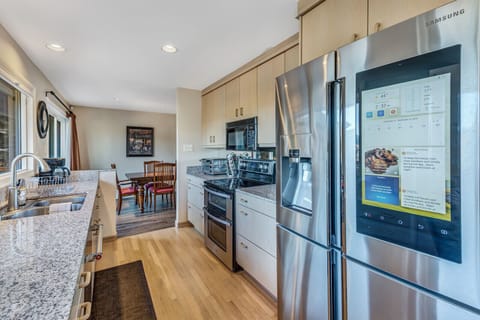 Massive fridge with built in touch screen full of apps