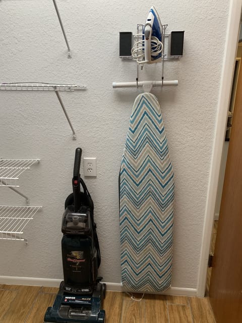 Iron, iron board and vacuum cleaner 