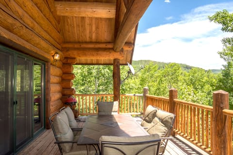 Wrap around deck off of living room with mountain views
