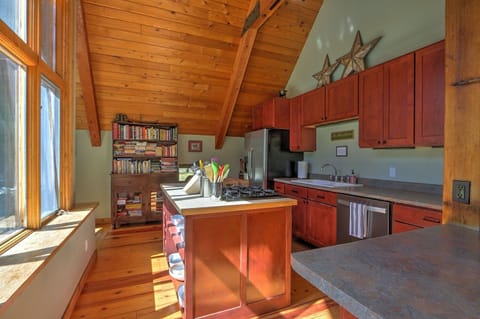 Spacious, well-equipped kitchen overlooking mountain scenery