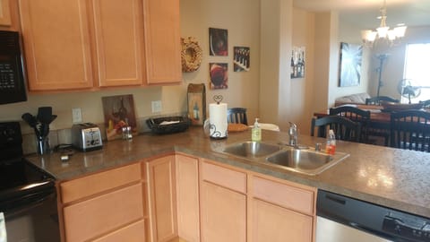 Kitchen with newer appliances, mountain and water view.