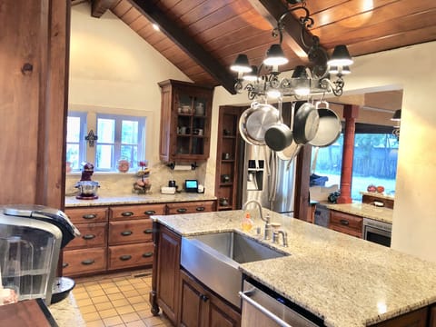 Plenty of pots, plates, silverware and utensils to cook to your heart's content!