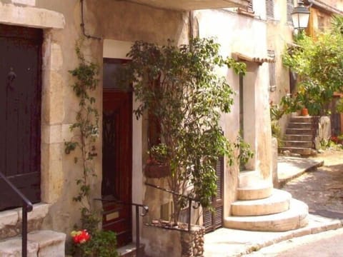 The wooden entrance door 