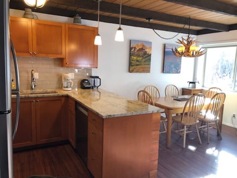 View of kitchen and dining area.