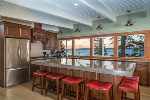 Large kitchen with a beautiful view.