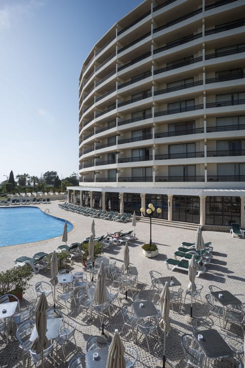 Indoor pool, outdoor pool, pool umbrellas, sun loungers