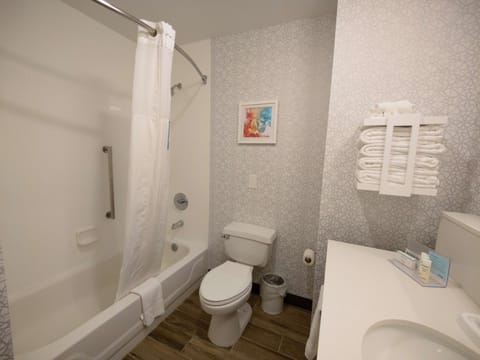 Room, 2 Queen Beds | Bathroom | Combined shower/tub, hydromassage showerhead, hair dryer, towels