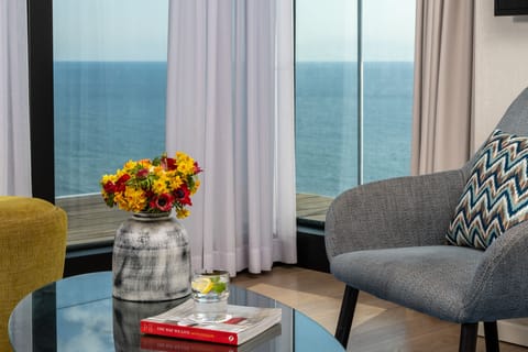 Executive Suite, 1 Bedroom, Balcony, Sea View | Living area | Flat-screen TV