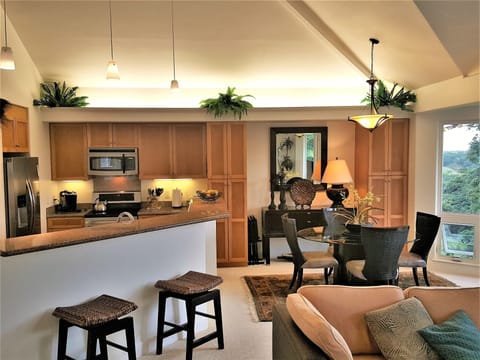 Open concept living room, dining room and kitchen.