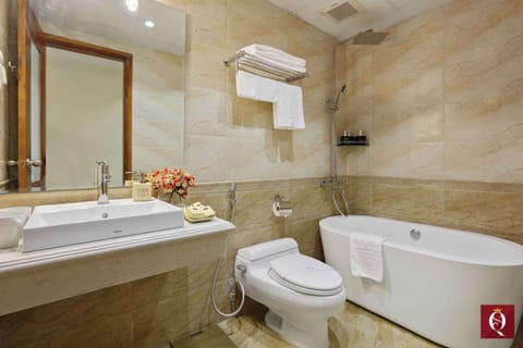 Suite, Balcony, City View | Bathroom | Rainfall showerhead, free toiletries, hair dryer, bathrobes