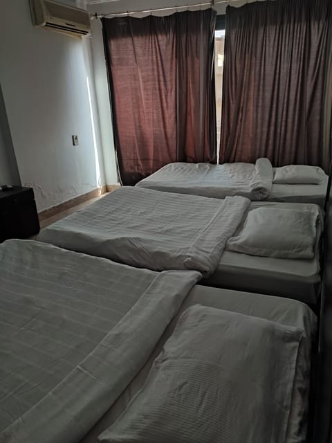 Triple Room, Private Bathroom | Minibar, in-room safe, free rollaway beds, WiFi