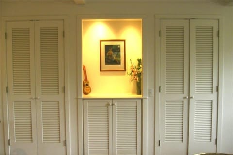 Entertainment Center hidden in cabinet to right of Art Niche