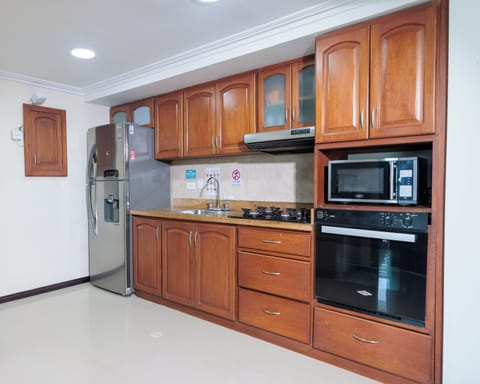 Panoramic Penthouse, Multiple Beds | Private kitchen | Full-size fridge, microwave, oven, stovetop