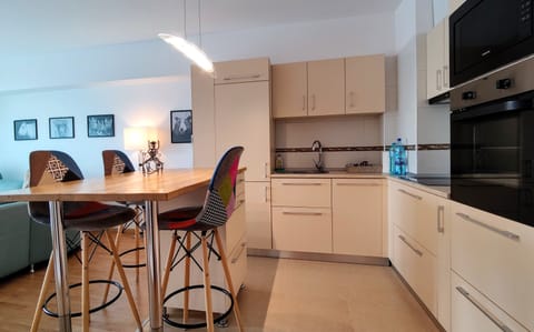 Premier Apartment | Private kitchen | Fridge, microwave, coffee/tea maker, electric kettle