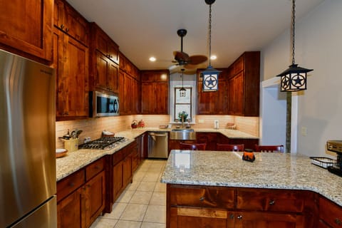 Relish cooking in this  fully equipped kitchen.