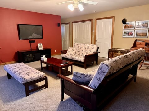 Living room with 55” TV.