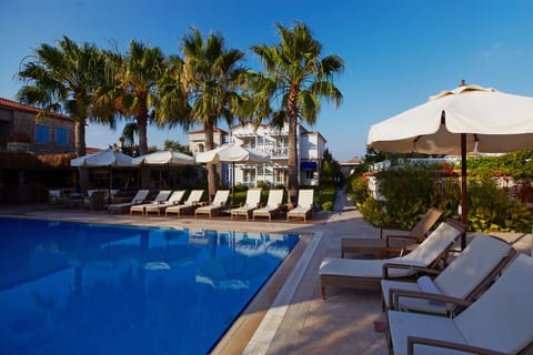 Outdoor pool, pool umbrellas, sun loungers