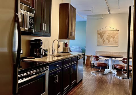 Executive Studio, Multiple Beds, Kitchen | Living area | Flat-screen TV