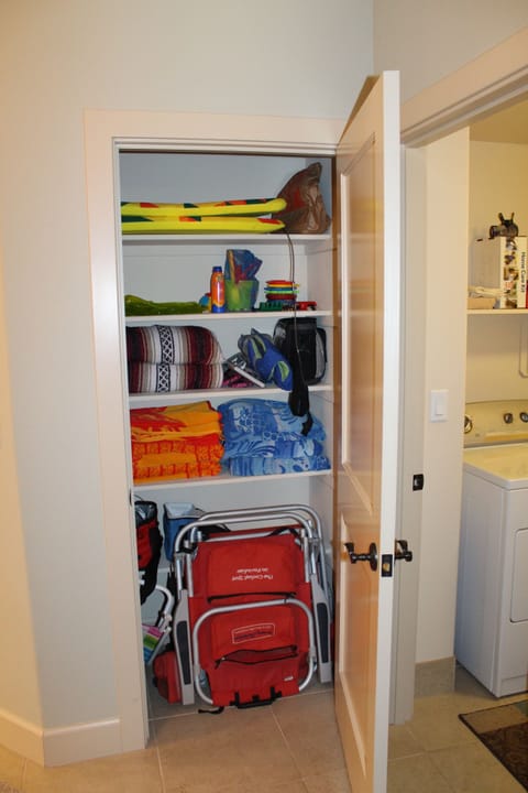 Foyer Closet with various beach items