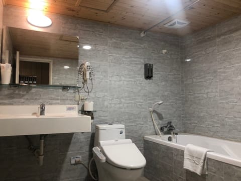 Superior Triple Room | Bathroom | Separate tub and shower, rainfall showerhead, hair dryer, slippers