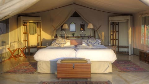 Entumoto main Luxury Tent | Egyptian cotton sheets, premium bedding, down comforters